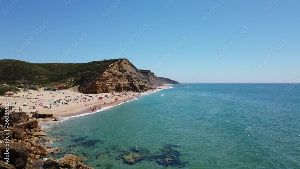 Amazing Sandy beach with Crystal clear water with blue sky in background in a summer day. Amazing Sandy beach with Crystal clear water with blue sky in background in a summer day.
