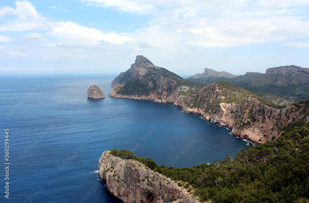 Beautiful panoramic landscape with sea coast in mountain area. Picturesque seascape with sky, water and coastline in summer day. Cape Formentor in Mallorca, Balearic island, Spain.