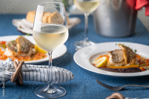 luxury french restaurant image  seabass poele with white wine