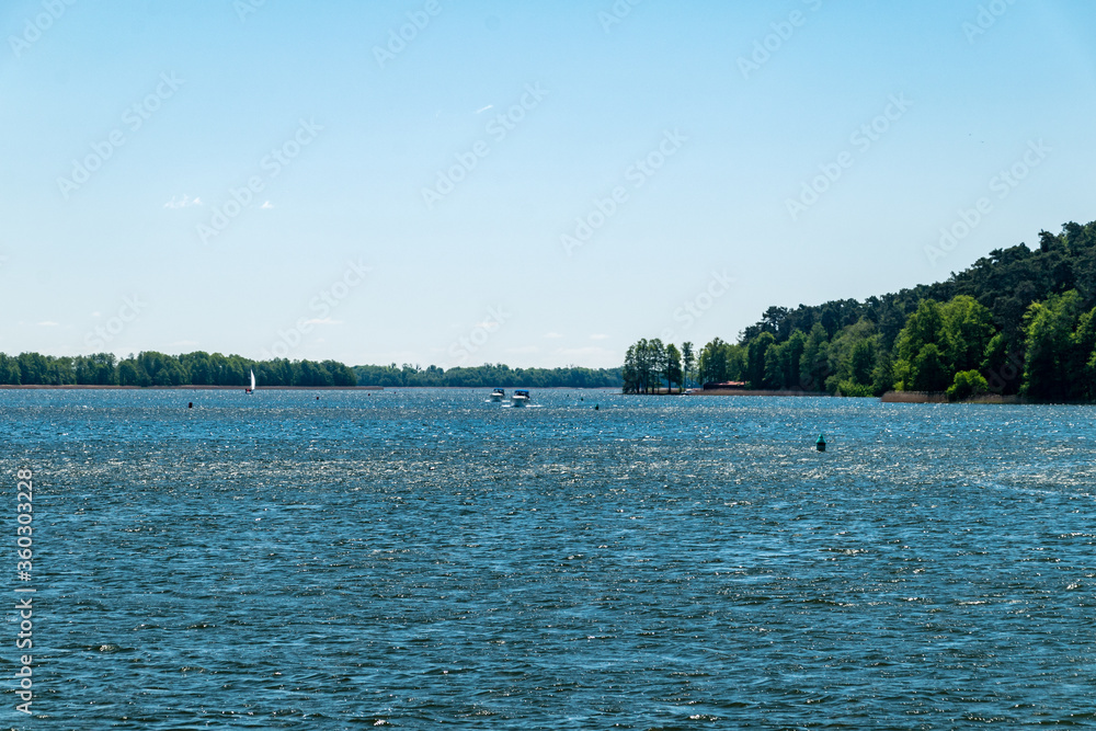 Sunny view on Mikolajskie lake.