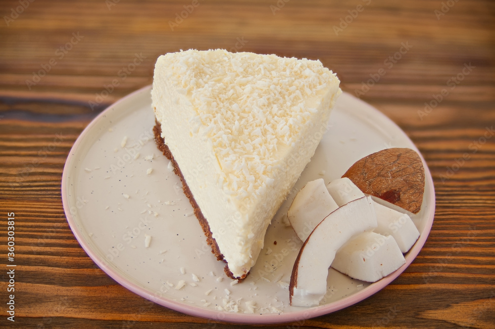 delicious cheesecake with coconut on plate delicious cheesecake with coconut on plate
