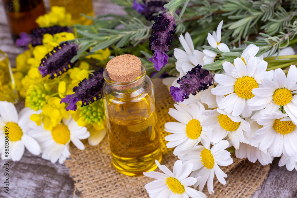 Mixed herbal oil. Essential oil various. Colorful flowers. Mixed herbal oil. Essential oil various. Colorful flowers.