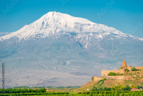 Big Ararat with a snow-capped peak and the monastery of Khor Virap, a tourist attraction of Armenia