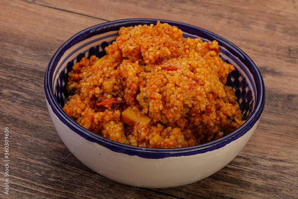 Couscos with tomato and chicken Couscos with tomato and chicken