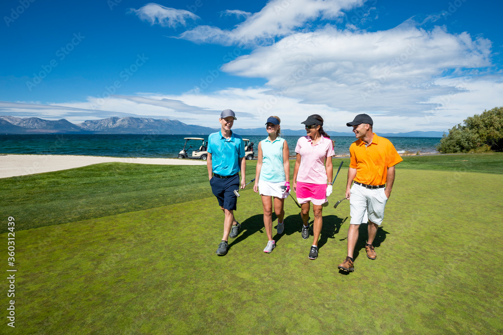 Four people playing golf at Edgewood Tahoe in Stateline, Nevada. Four people playing golf at Edgewood Tahoe in Stateline, Nevada.