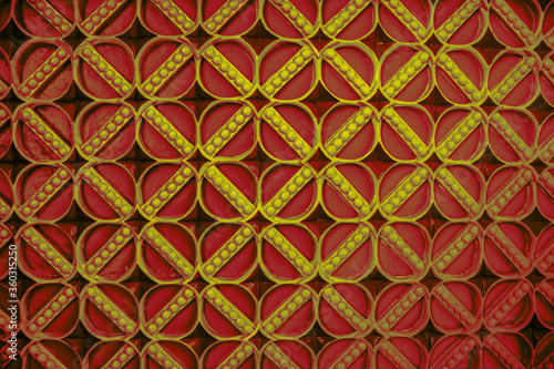 Red and yellow pattern with maroon blobs