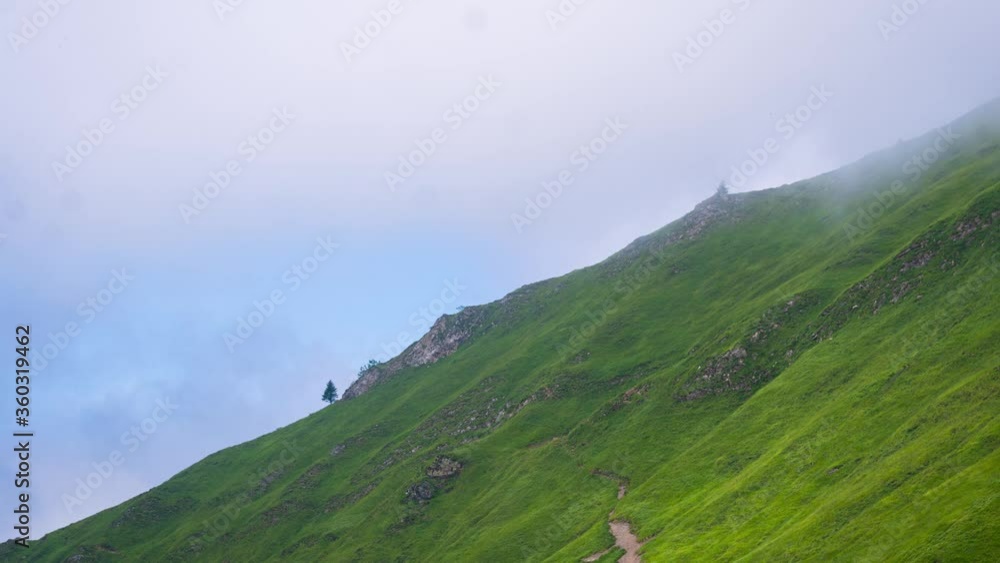 Timelapse of the mist on a green mountain in the Pyrenees
