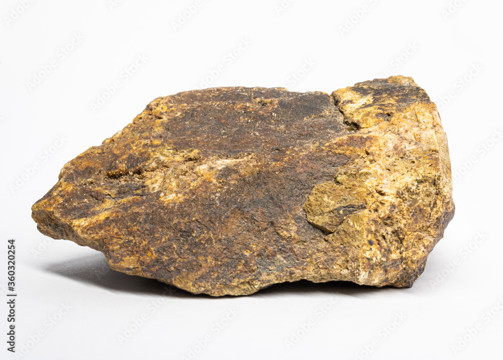 Stone with golden dots, on a white background Stone with golden dots, on a white background