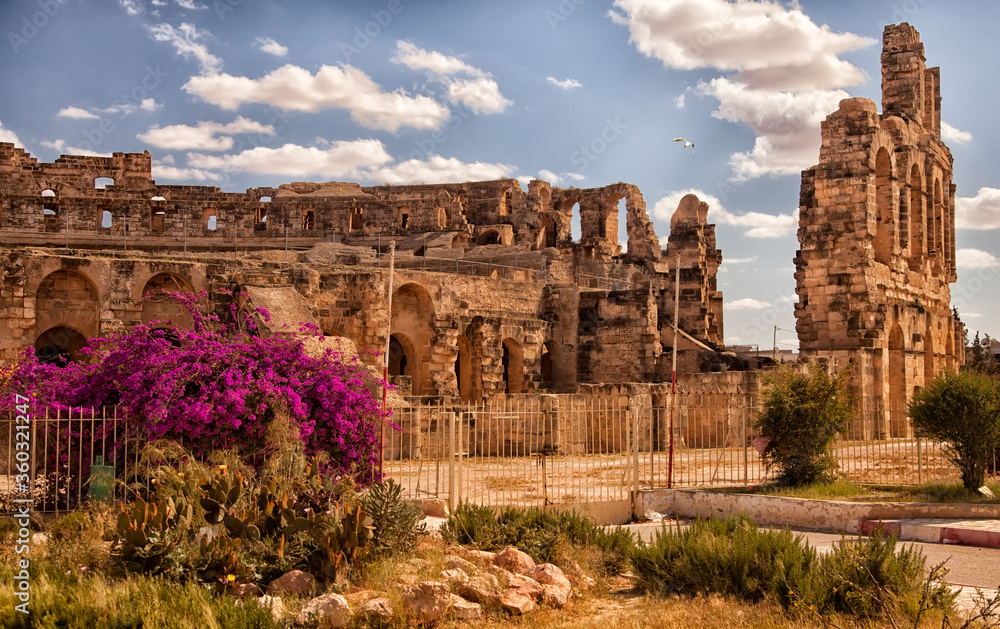 View ruins best preserved and largest Colosseum of El Jam. Architectural ruins of an amphitheater in Tunis, shot by crane. World best tourist destinations. Attractions in North Africa. Roman empire