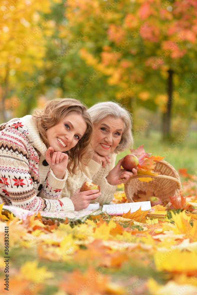 Portrait of senior woman with daughter resting Portrait of senior woman with daughter resting
