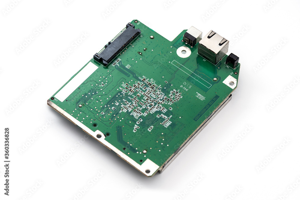 Opened USB harddrive (internal circuit board) isolate on white background. Opened USB harddrive (internal circuit board) isolate on white background.