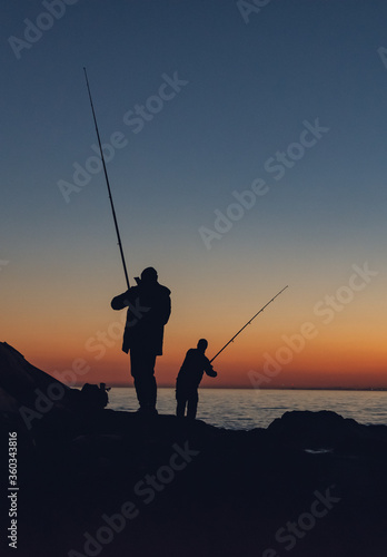 fishing at sunset