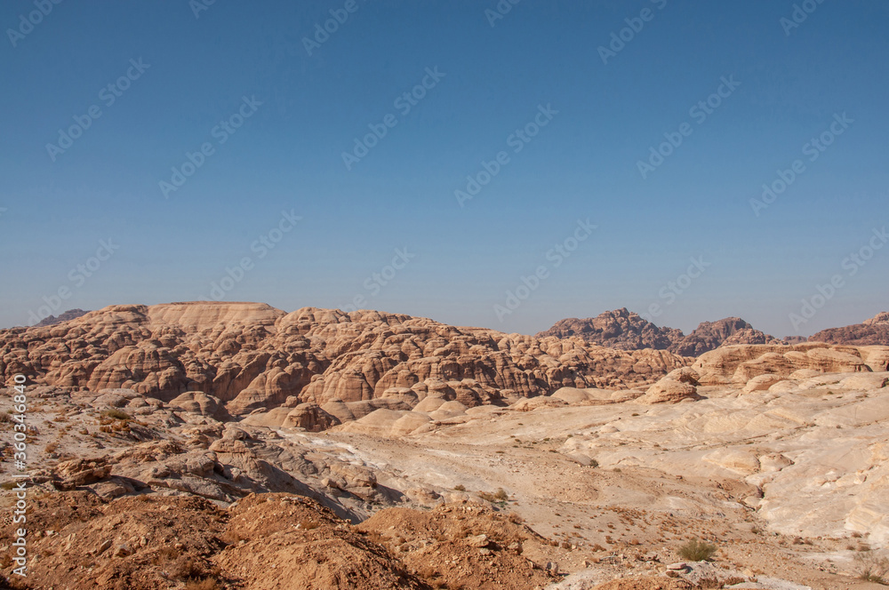 Ancient tombs carved in stone in Petra, Jordan