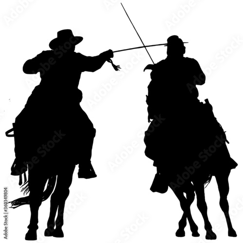 Fototapeta silhouette of a two American Civil war soldiers on horseback sword fighting