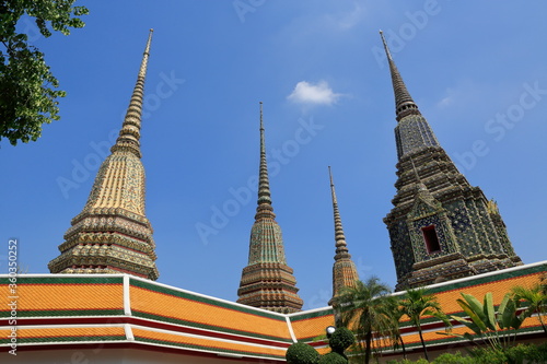 Wat Pho Buddhist Temple. Bangkok, Thailand. Every detail in the temple area, decorated with extraordinary decorations, is appreciated by all visitors.