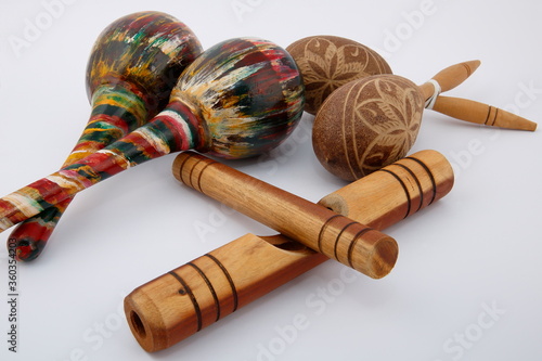 Folkloric musical instruments.
A view of Latin rhythm instruments used in Cuban music, on white background.