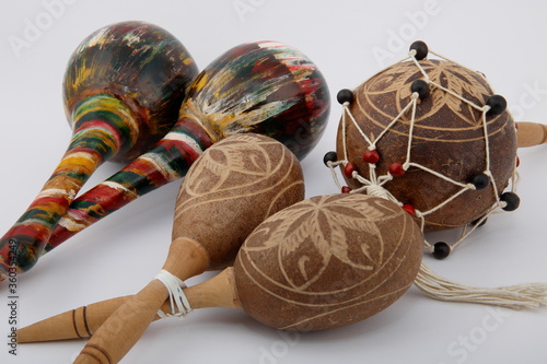 Folkloric musical instruments.
A view of Latin rhythm instruments used in Cuban music, on white background.