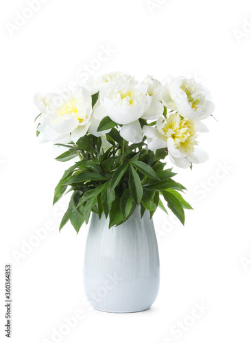 Beautiful blooming peonies in vase isolated on white © New Africa
