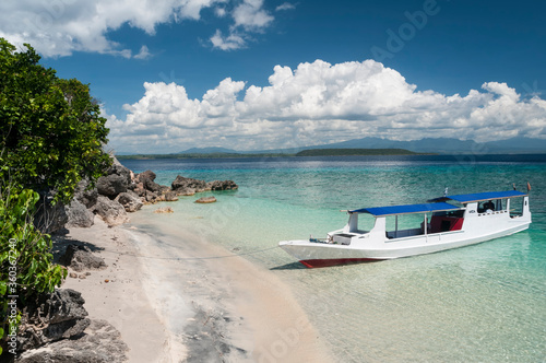 tropical beach in moyo island, indonesia photo