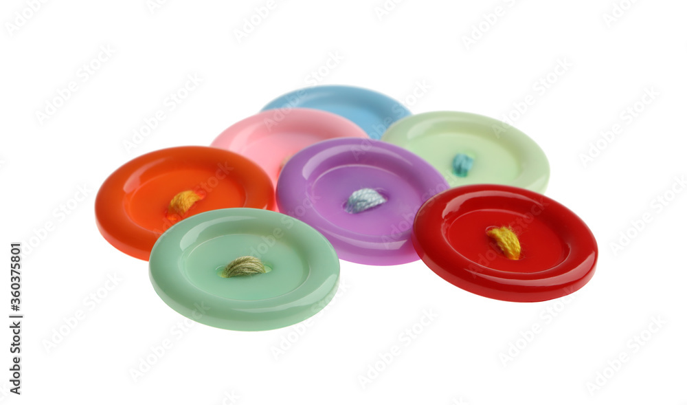 Many colorful sewing buttons on white background Many colorful sewing buttons on white background