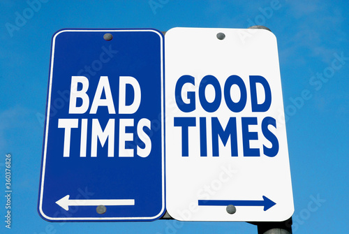 Roadsign giving directions for Bad Times or Good Times.