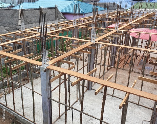 Obraz na płótnie Scaffolding or staging is temporary structure used to support work crew and materials to aid in construction, maintenance and repair of buildings. w salonie