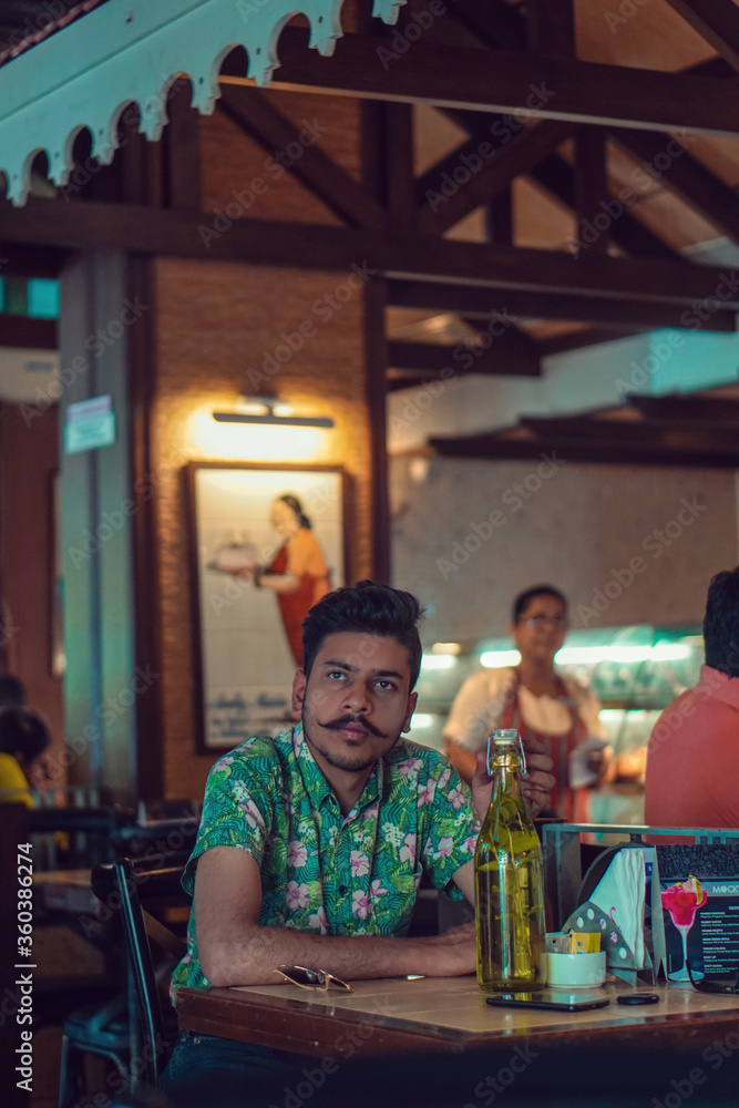 young man in restaurant