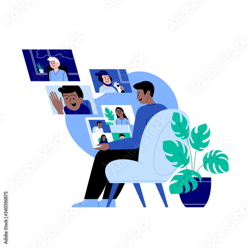 A man staying home meeting up with work team or friends online via conference video call