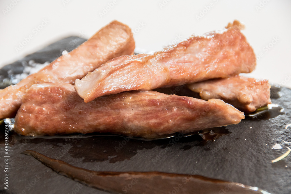 Iberian secret dish on a white background Iberian secret dish on a white background