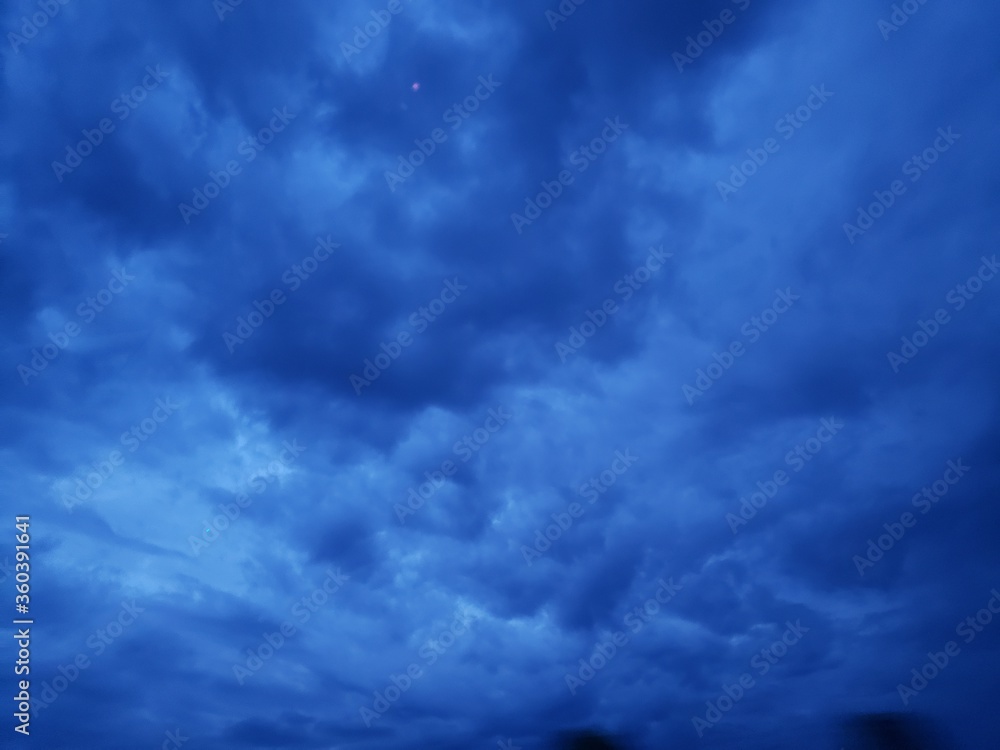dark, dramatic blue storm clouds dark, dramatic blue storm clouds