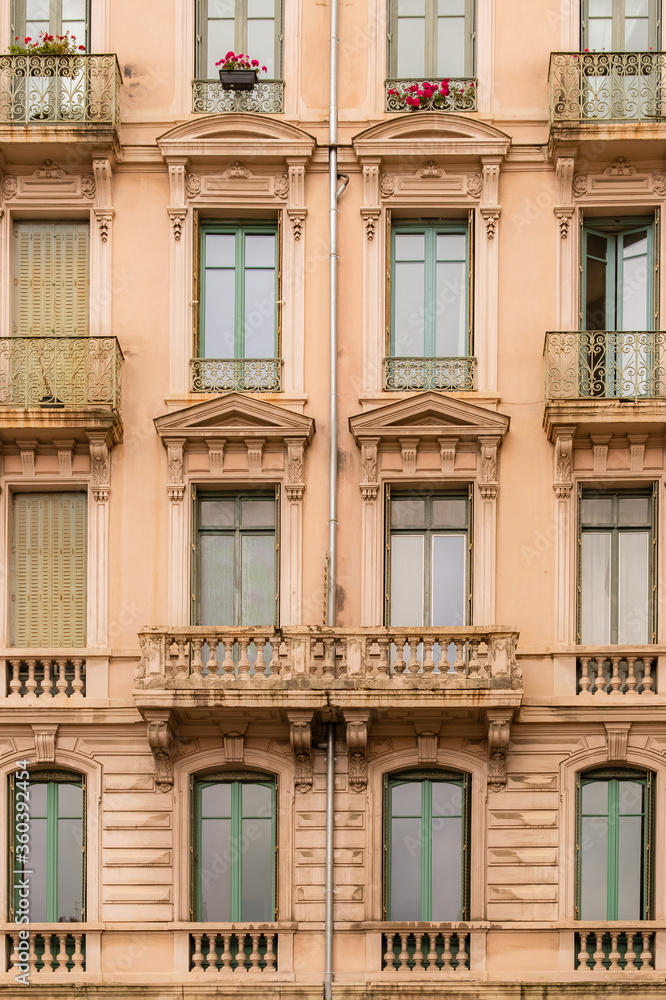 Lyon, beautiful ancient windows, typical building in the south of France
