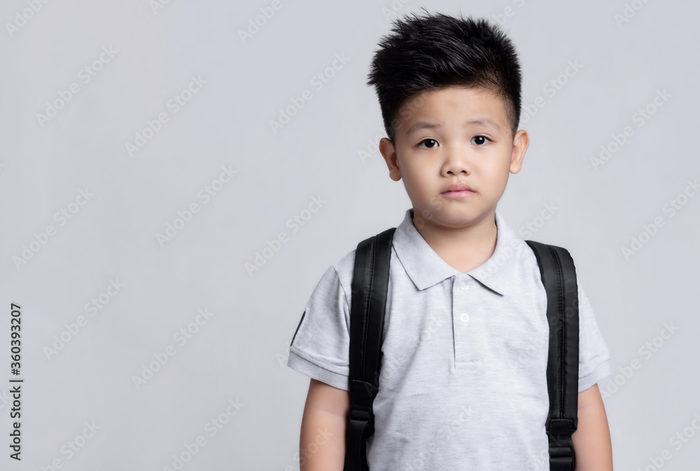 Cute little child with backpack having fun. School concept. Back to School Cute little child with backpack having fun. School concept. Back to School