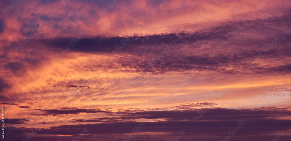 pink turning orange with purple at sunset