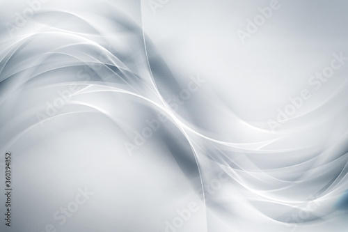 Futuristic white waves on grey backgound