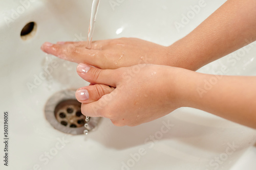 washing hands with soap under the tap. There is no pandemic.