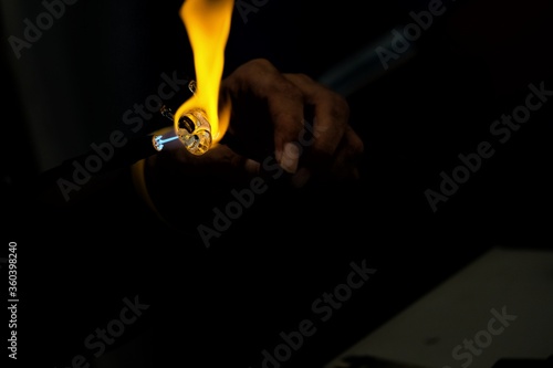 close up of a man using a Spit fire
