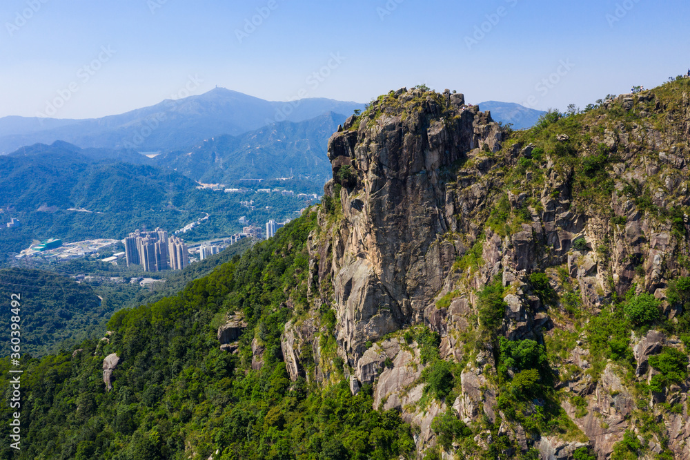 Hong Kong lion rock mountain from blue sky
