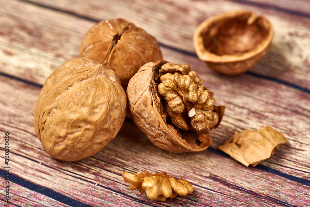 Walnuts on a wooden table Walnuts on a wooden table