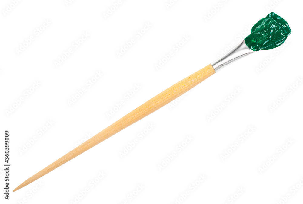 flat paint brush with green colored tip in blot and long wooden handle isolated on white background flat paint brush with green colored tip in blot and long wooden handle isolated on white background