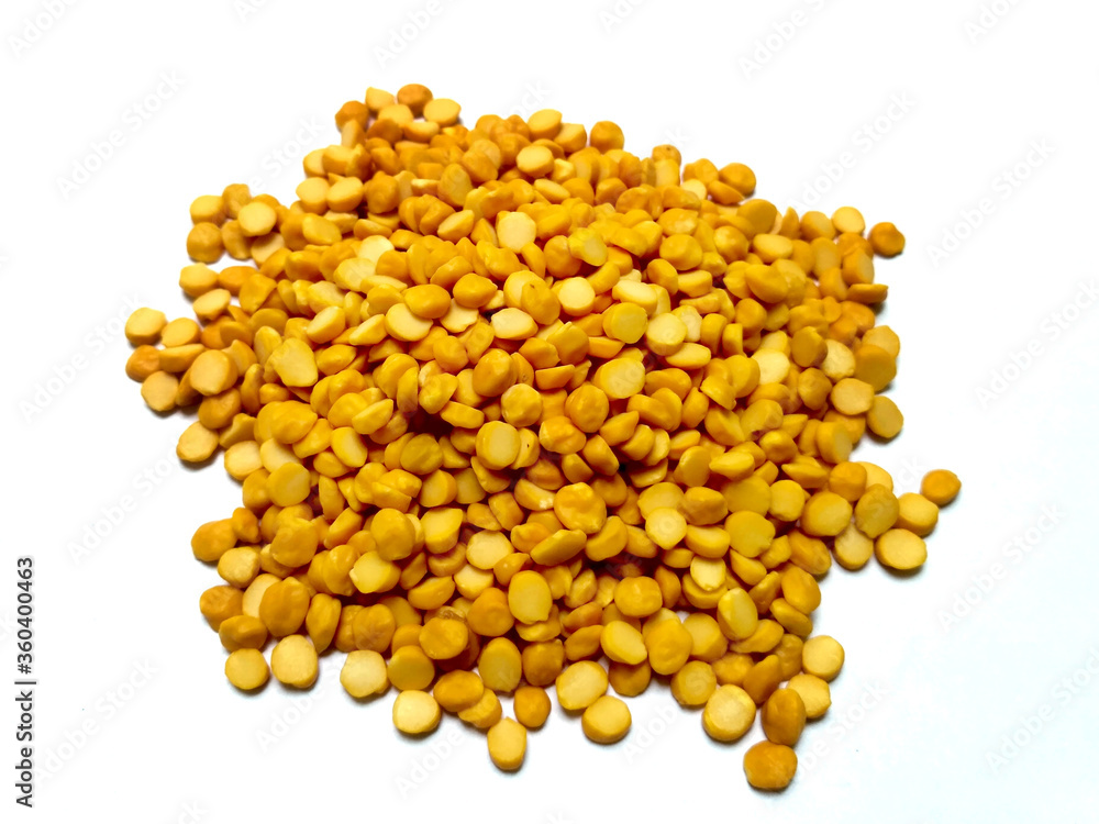 Split Chickpea Also Know as Chana Dal, Yellow Chana Split Peas, Dried Chickpea Lentils or Toor Dal isolated on white Background Split Chickpea Also Know as Chana Dal, Yellow Chana Split Peas, Dried Chickpea Lentils or Toor Dal isolated on white Background