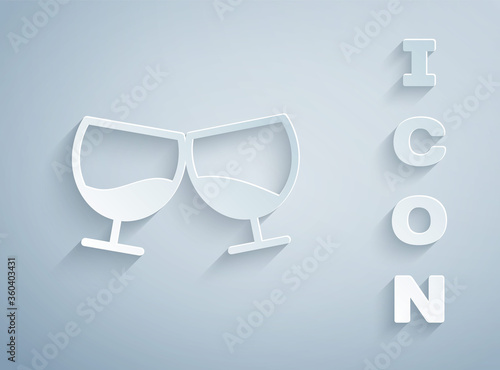 Paper cut Glass of cognac or brandy icon isolated on grey background. Paper art style. Vector Illustration.