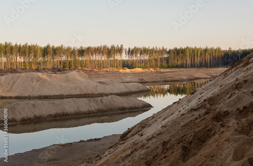 Fototapeta Naklejka Na Ścianę i Meble -  Spring landscape of a closed sand pit.