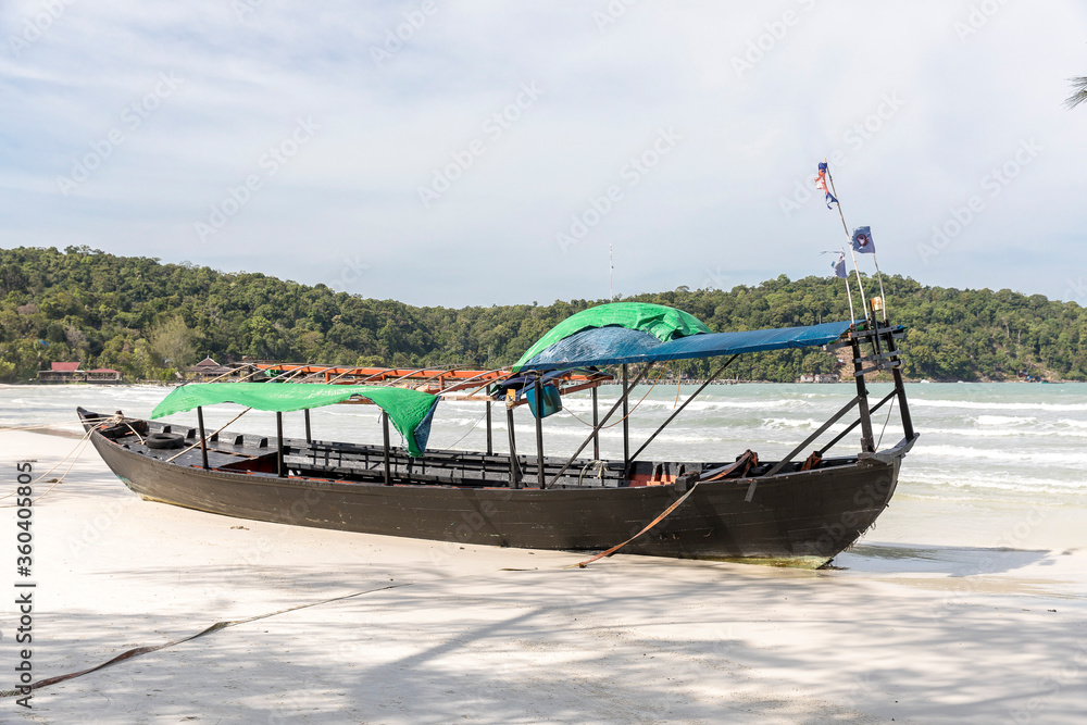 Boat on the beach, Saracen bay beach, Koh Rong Samloem island, Sihanoukville, Cambodia.