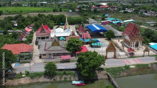 Aerial city view from flying drone at Wat Prem Prachakon ,Chiang Rak Noi, Bang Pa-in District, Phra Nakhon Si Ayutthaya,Thailand
 photo