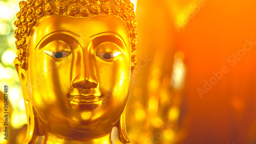 The face of the Golden Buddha statue in the church