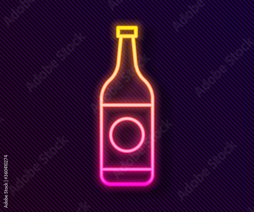 Glowing neon line Beer bottle icon isolated on black background. Vector Illustration.