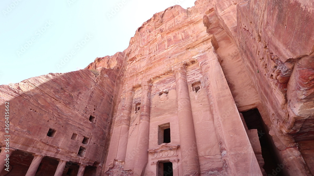 The elegant urn tomb is cut deeply into the cliff face, Petra.