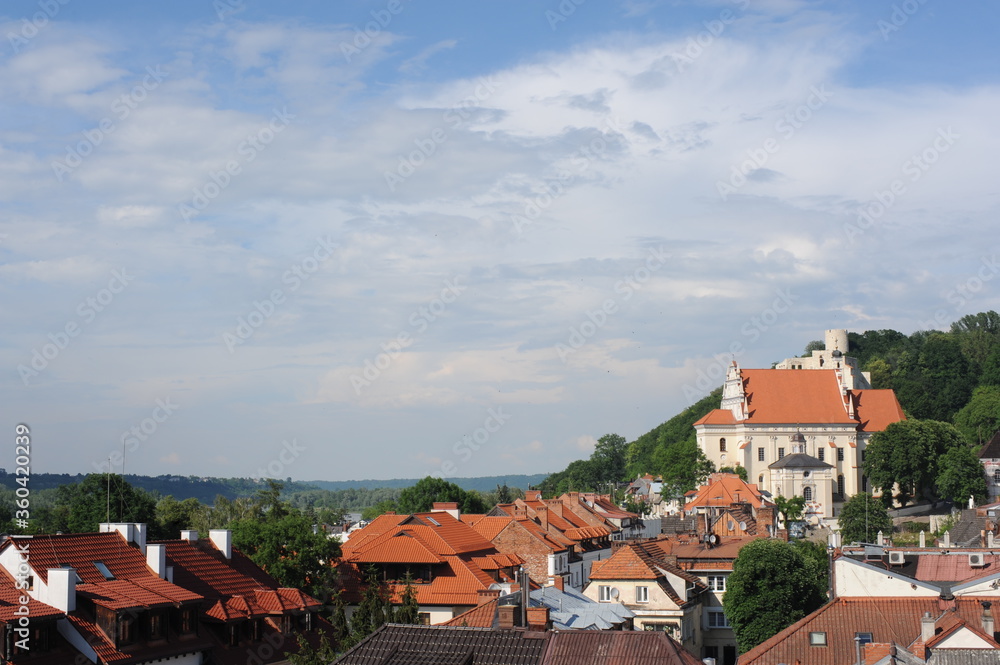 A panorama of beautiful picturesque medieval town Kazimierz Dolny in Poland with blue sky and clouds in summer
