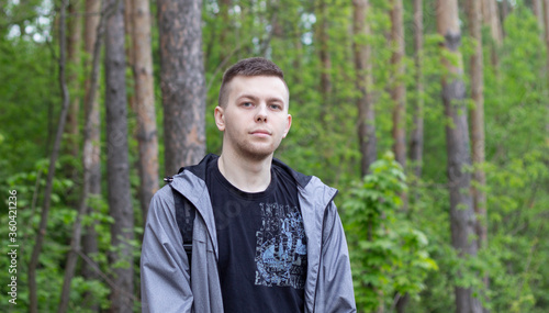 young man in a forest
