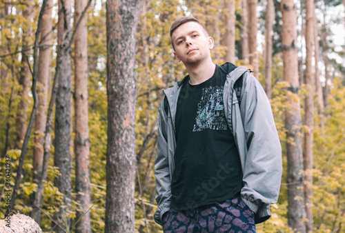 young man in a forest